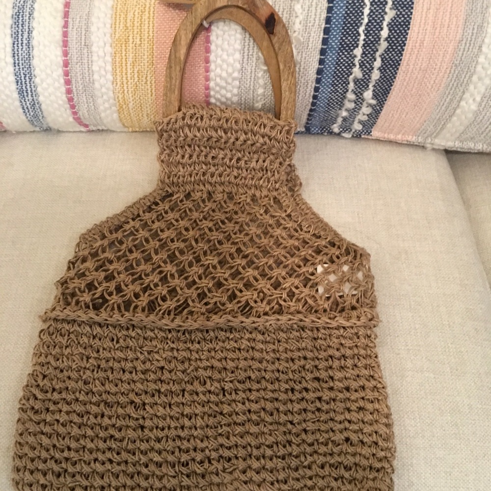 Macrame handbag with wooden handles in natural color